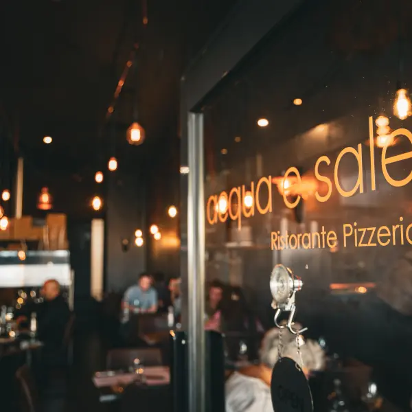 A restaurant dining room and venue signage photographed for restaurant photography in Perth.