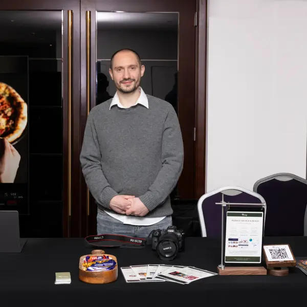 Branded exhibitor stand photographed before visitor activity