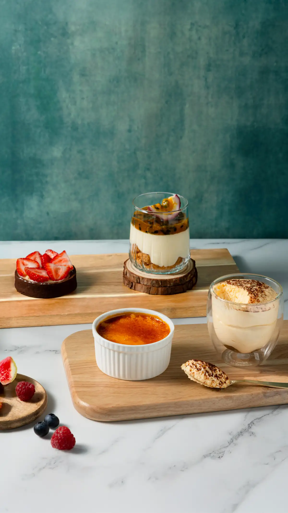 An assorted pastry and dessert trio photographed for cafe photography in Perth.