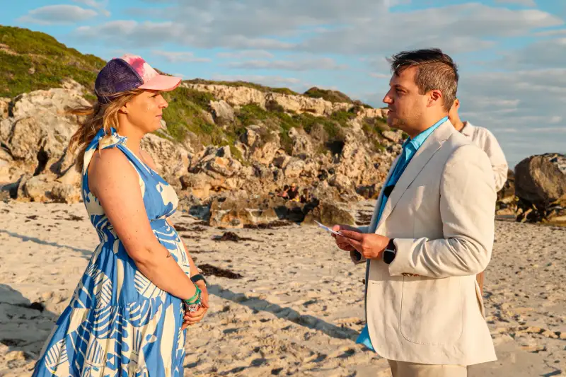Family gathered for a private vow-renewal ceremony on a Perth beach.