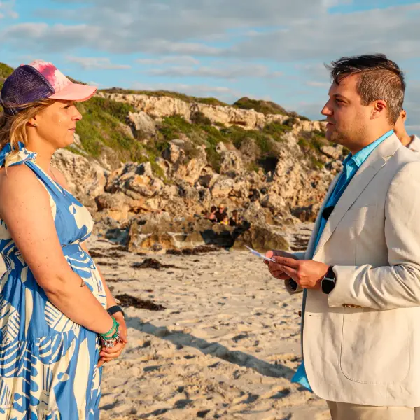 Family gathered for a private vow-renewal ceremony on a Perth beach.