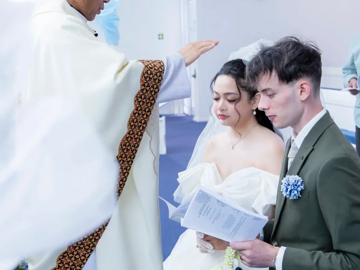 Close-up of the bride during a church reading at Pater Noster Catholic Church in Myaree