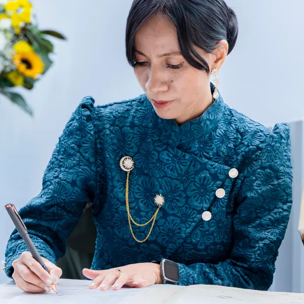 Bride signing the wedding register during a Perth ceremony.