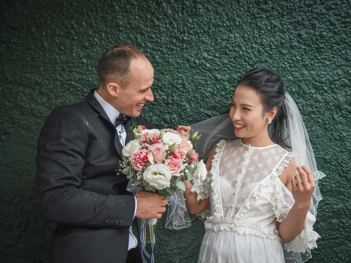Wedding couple laughing naturally during a relaxed Perth portrait.