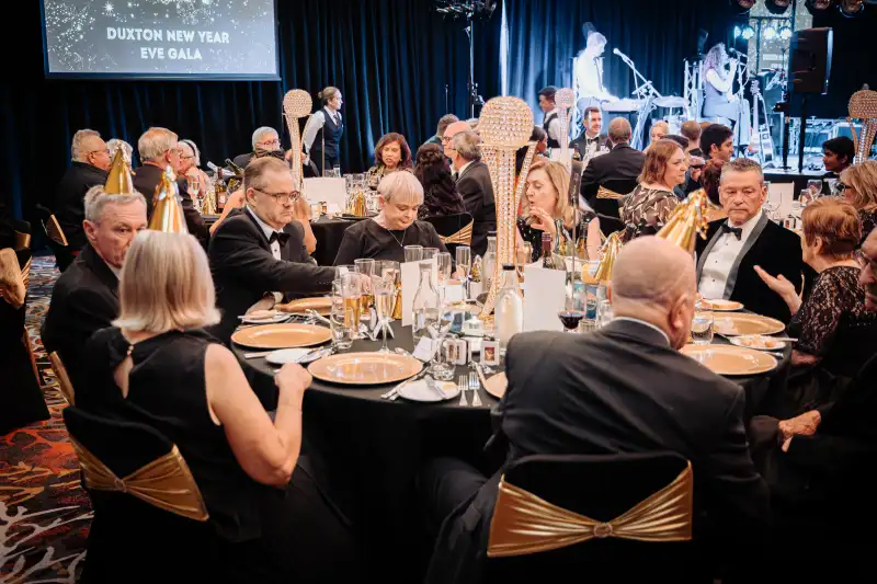 Conference stage and seated audience at a Perth gala event venue, showing lighting and layout from a photographer's perspective