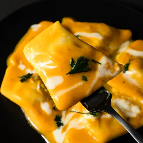 Creamy ravioli photographed for a Perth restaurant menu.
