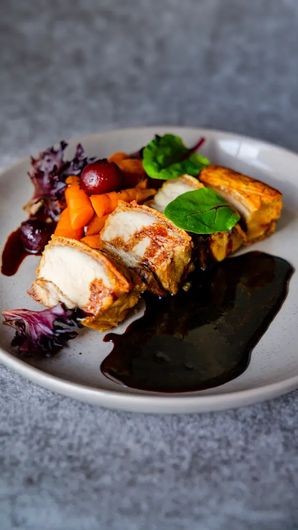 Crispy pork belly plated for a food truck menu, street food photography in Perth.