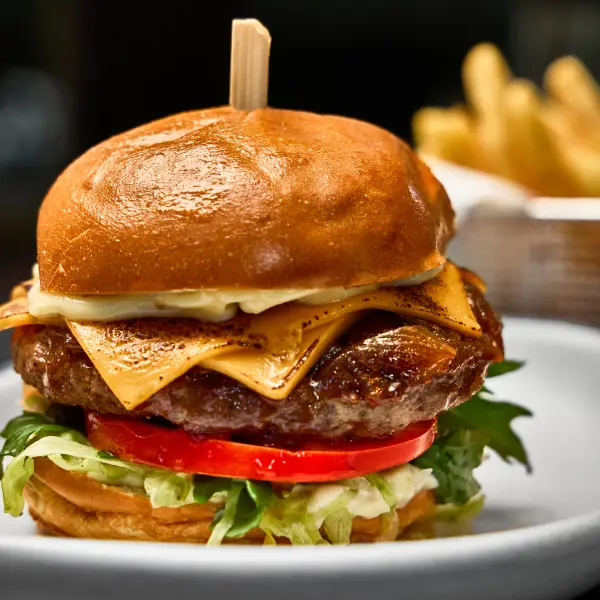 A takeaway burger photographed for menu photography in Perth.