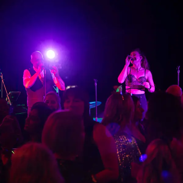 Guests and entertainment photographed at a formal Perth event.