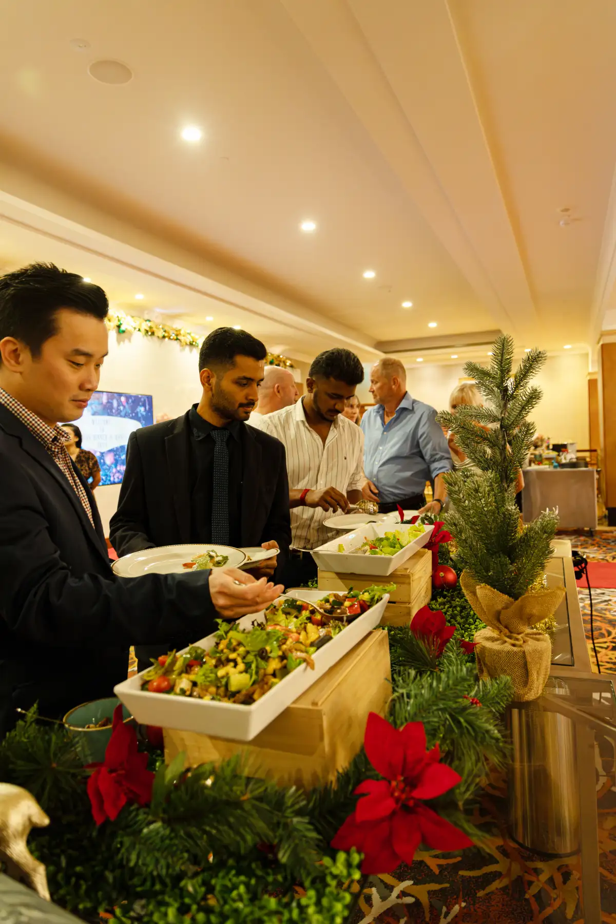 Guests moving through catered service photographed for catering photography in Perth.
