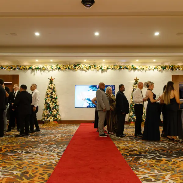 Red-carpet guest arrivals at a Perth formal event