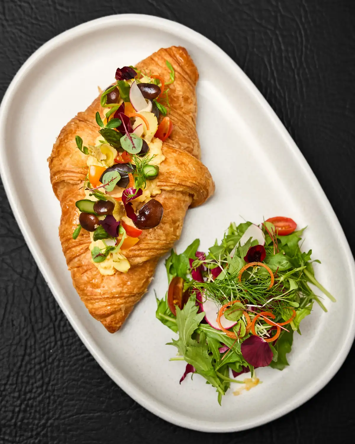 A savoury cafe croissant photographed for cafe photography in Perth.