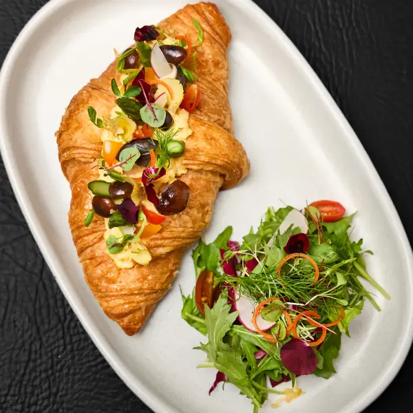 A savoury cafe croissant photographed for cafe photography in Perth.