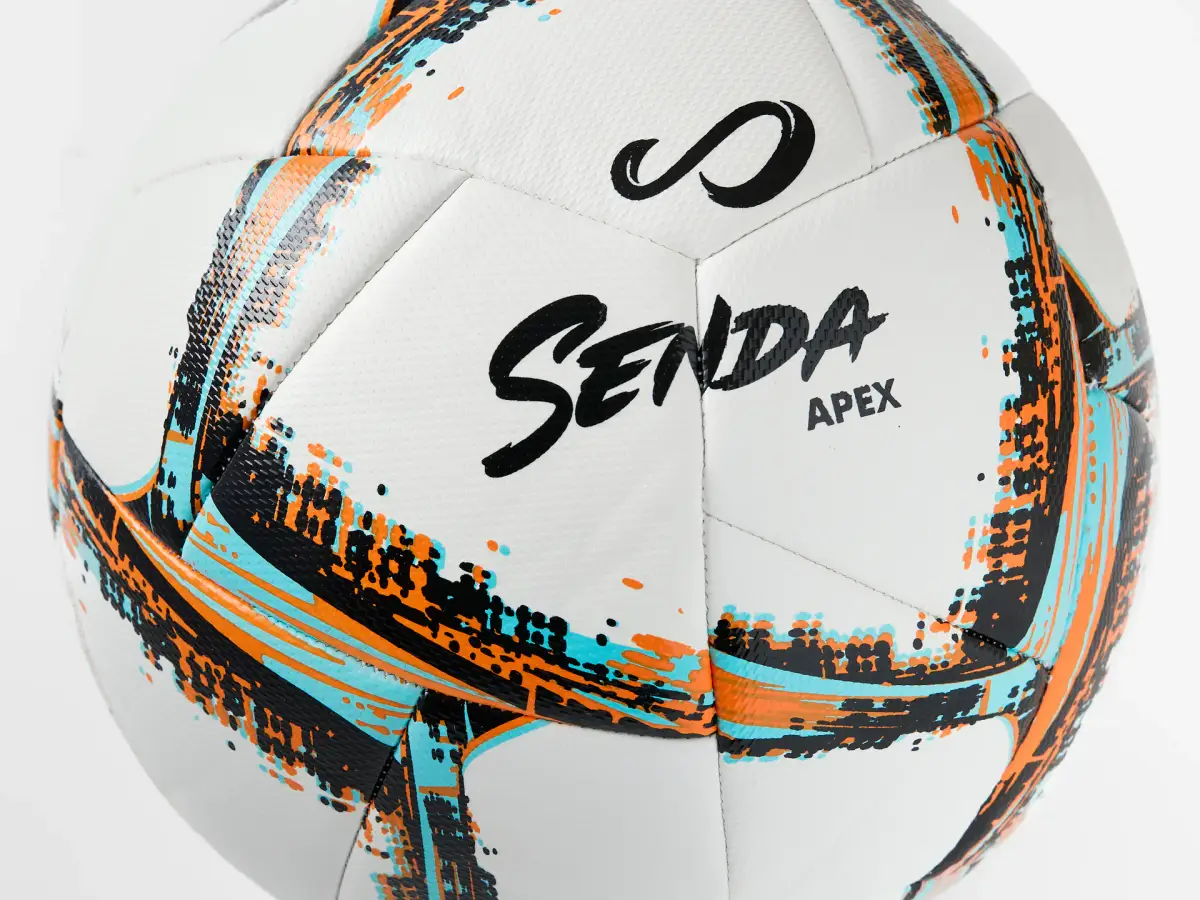 Senda Apex white futsal ball with black, orange, and aqua graphics photographed close-up on white