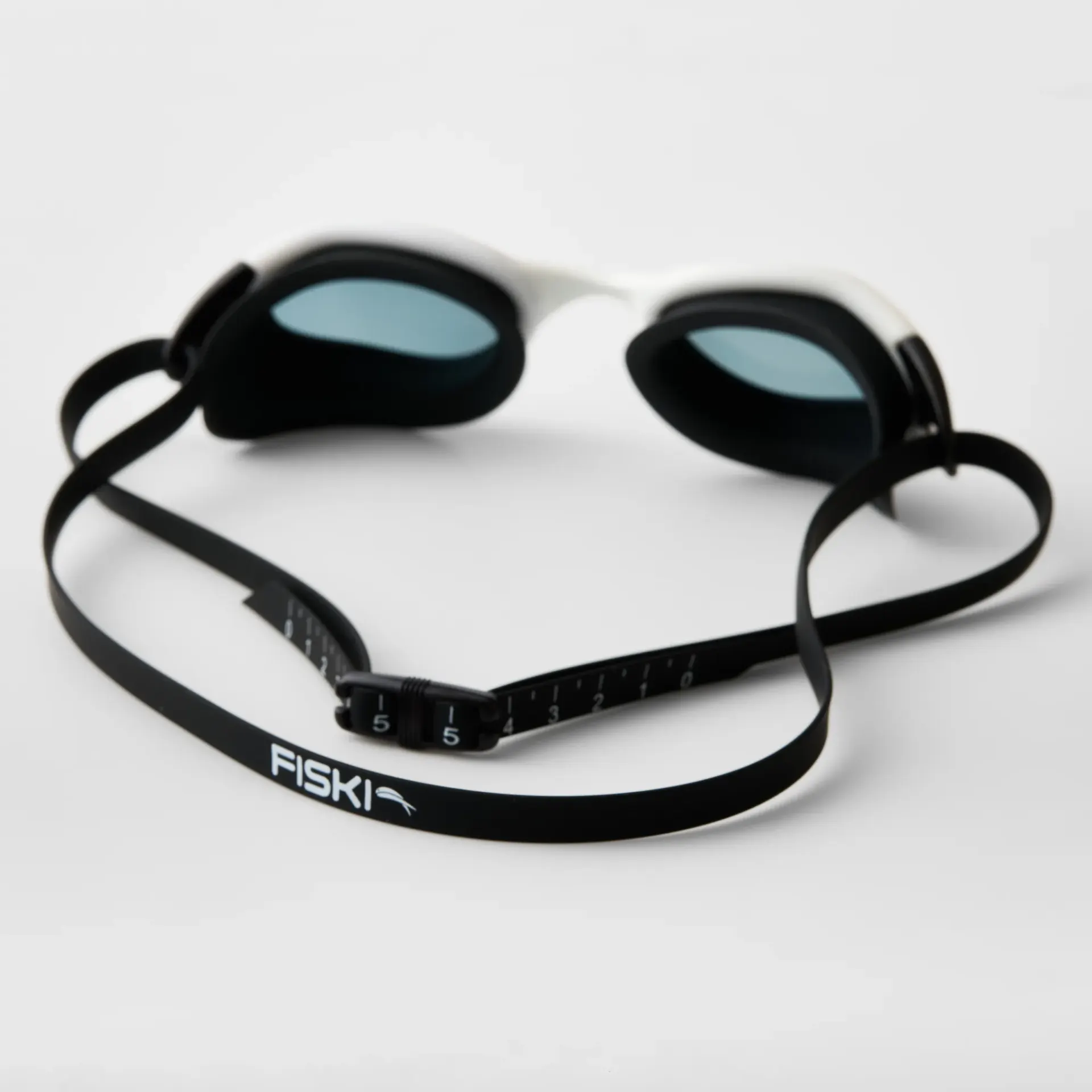 Rear view of Fiski swimming goggles showing product fit and construction details.