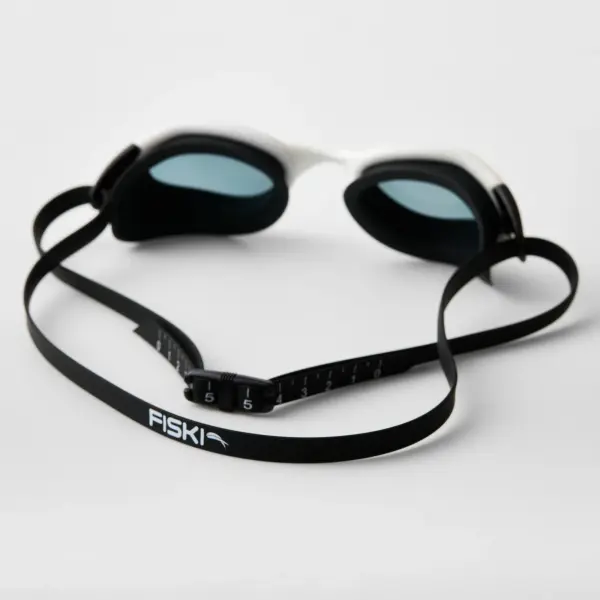 Rear view of Fiski swimming goggles showing the silicone gasket and adjustable strap.