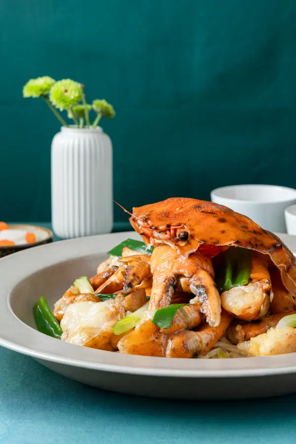 Ginger and shallot mud crab, seafood bar photography for Perth hospitality venues.