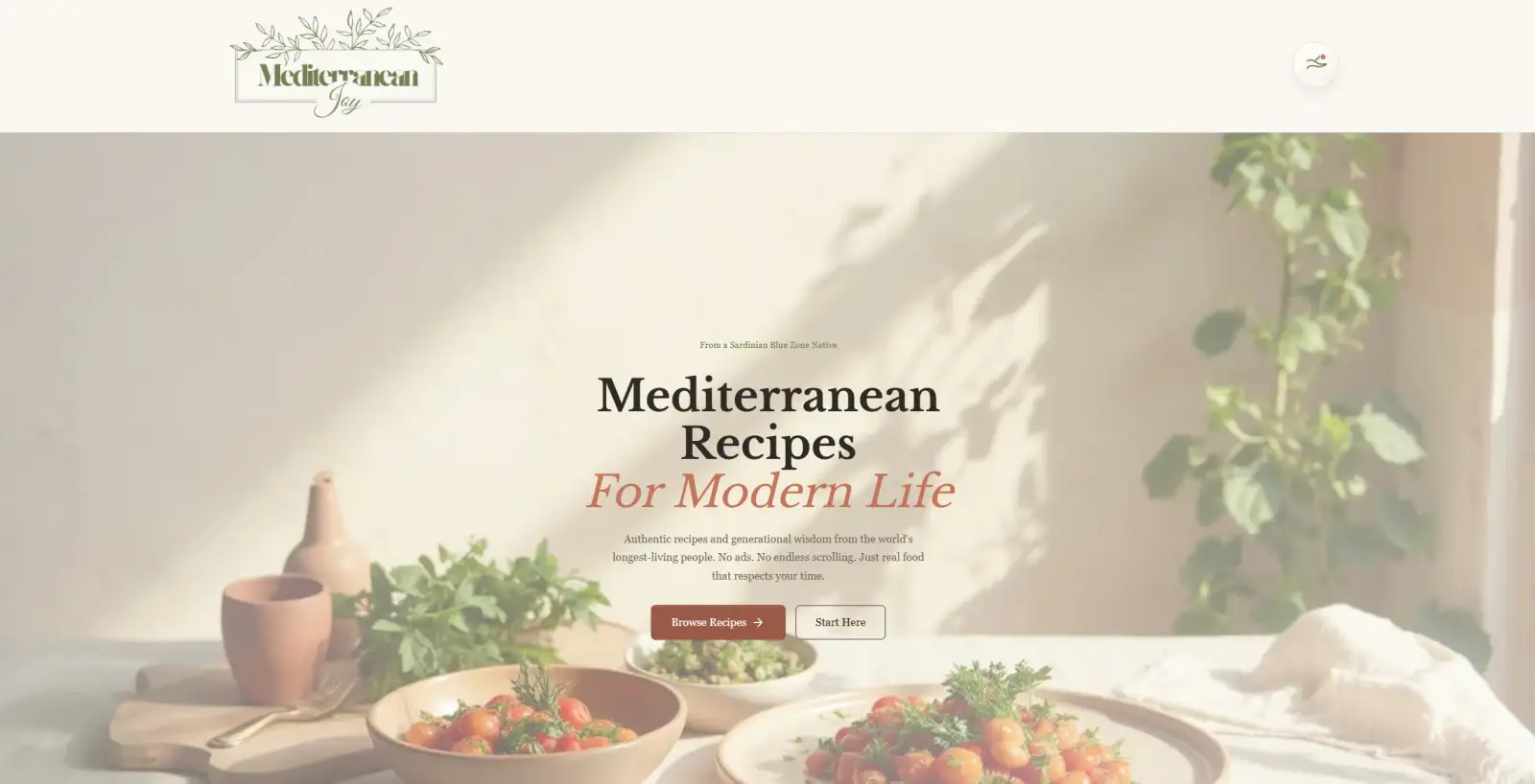 Mediterranean Joy website homepage showing an editorial Mediterranean hero section with warm food photography and story-led copy