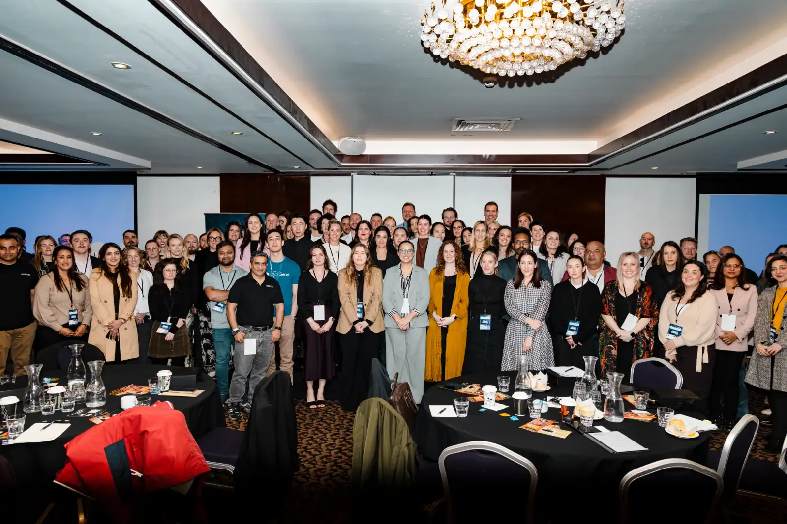 Group photo of more than 200 delegates at the Intrigue MADVERSE marketing summit in the Pagoda Resort and Spa conference room in Perth
