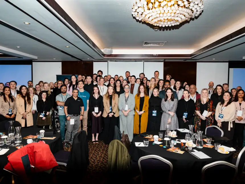 Group photo of more than 200 delegates at the Intrigue MADVERSE marketing summit in the Pagoda Resort and Spa conference room in Perth