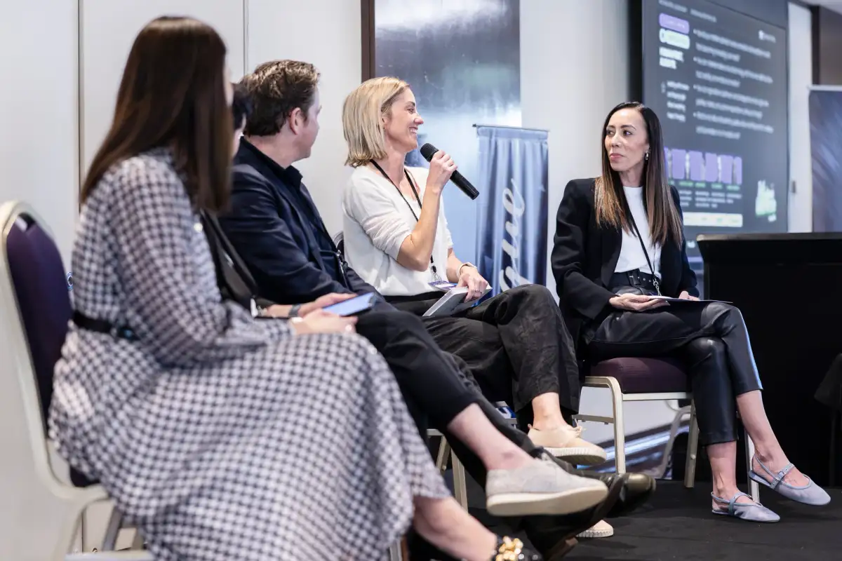 Panel speakers photographed during a Perth business conference.