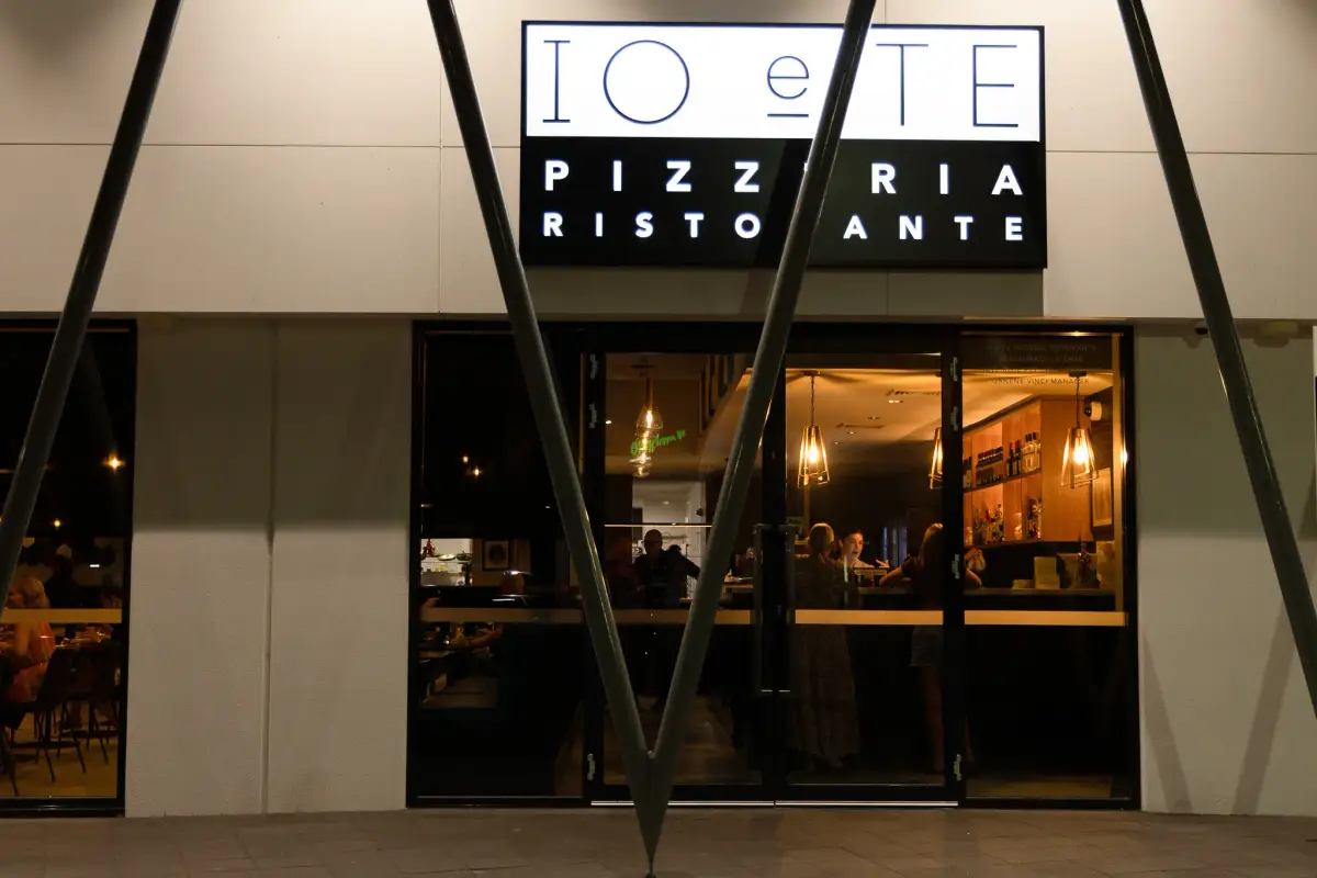 Night exterior of Io e Te Pizzeria e Ristorante in Success Perth