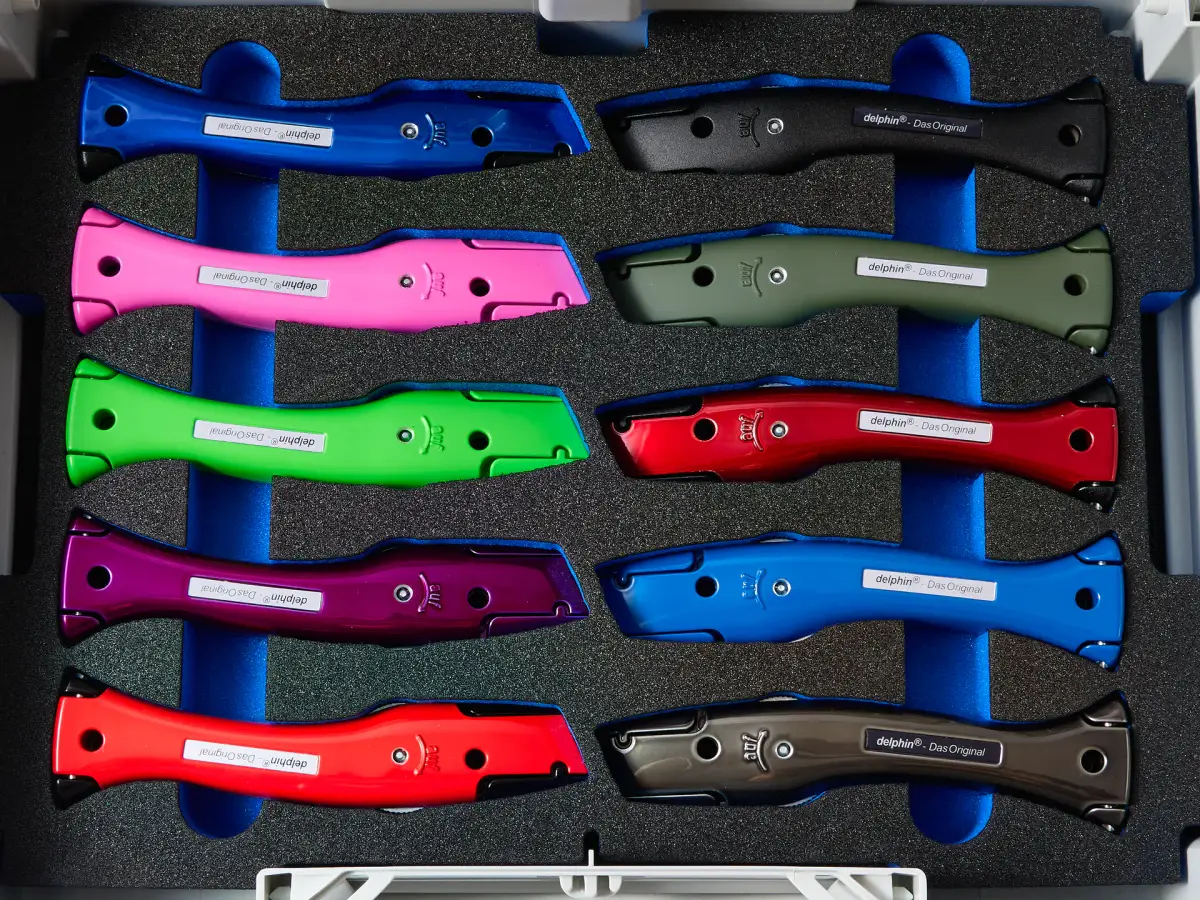 Janser premium Dolphin knife set in multiple colours arranged inside a fitted presentation case