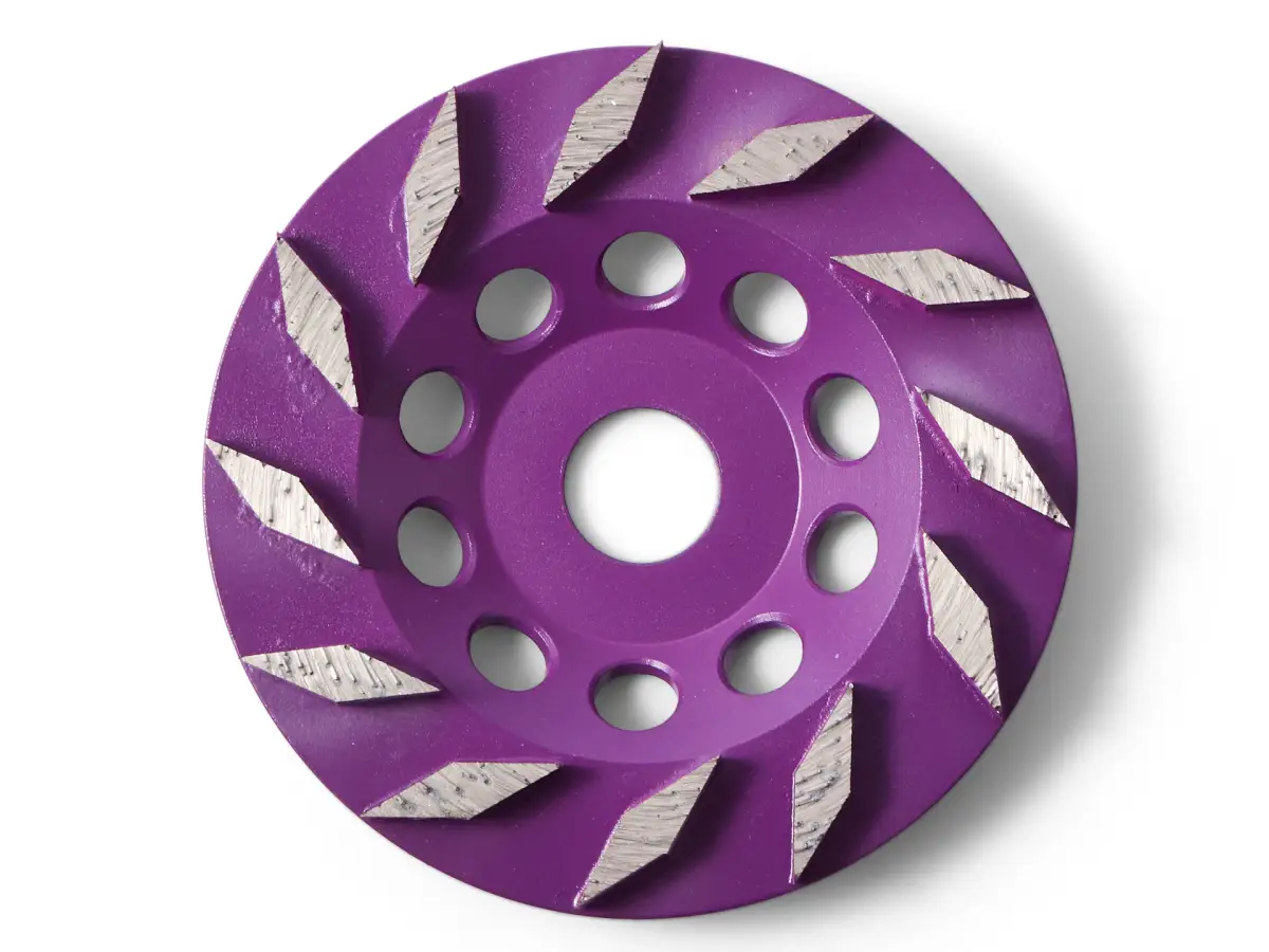 Purple Kevmor Star B cup wheel photographed from above to show its segmented grinding surface