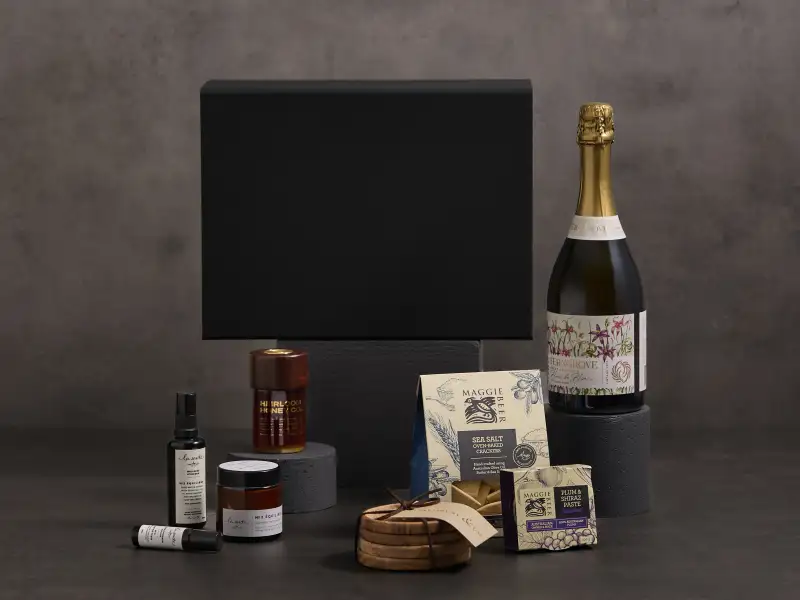 Premium gift hamper styled as a dark campaign scene.
