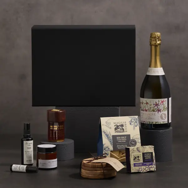 Premium gift hamper styled as a dark campaign scene.
