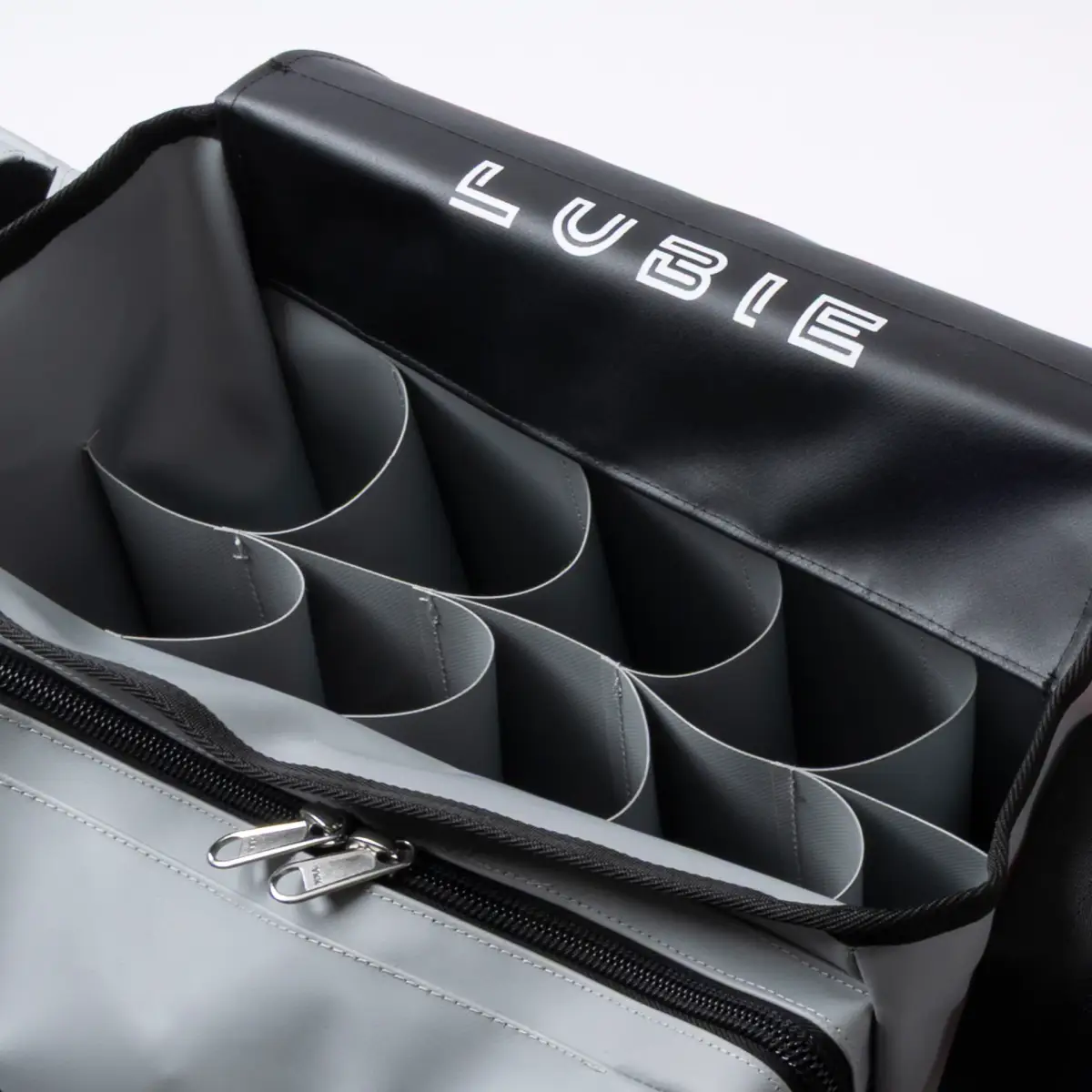 Close-up of the Lubie SPL 500 bag showing its labelled internal cartridge dividers