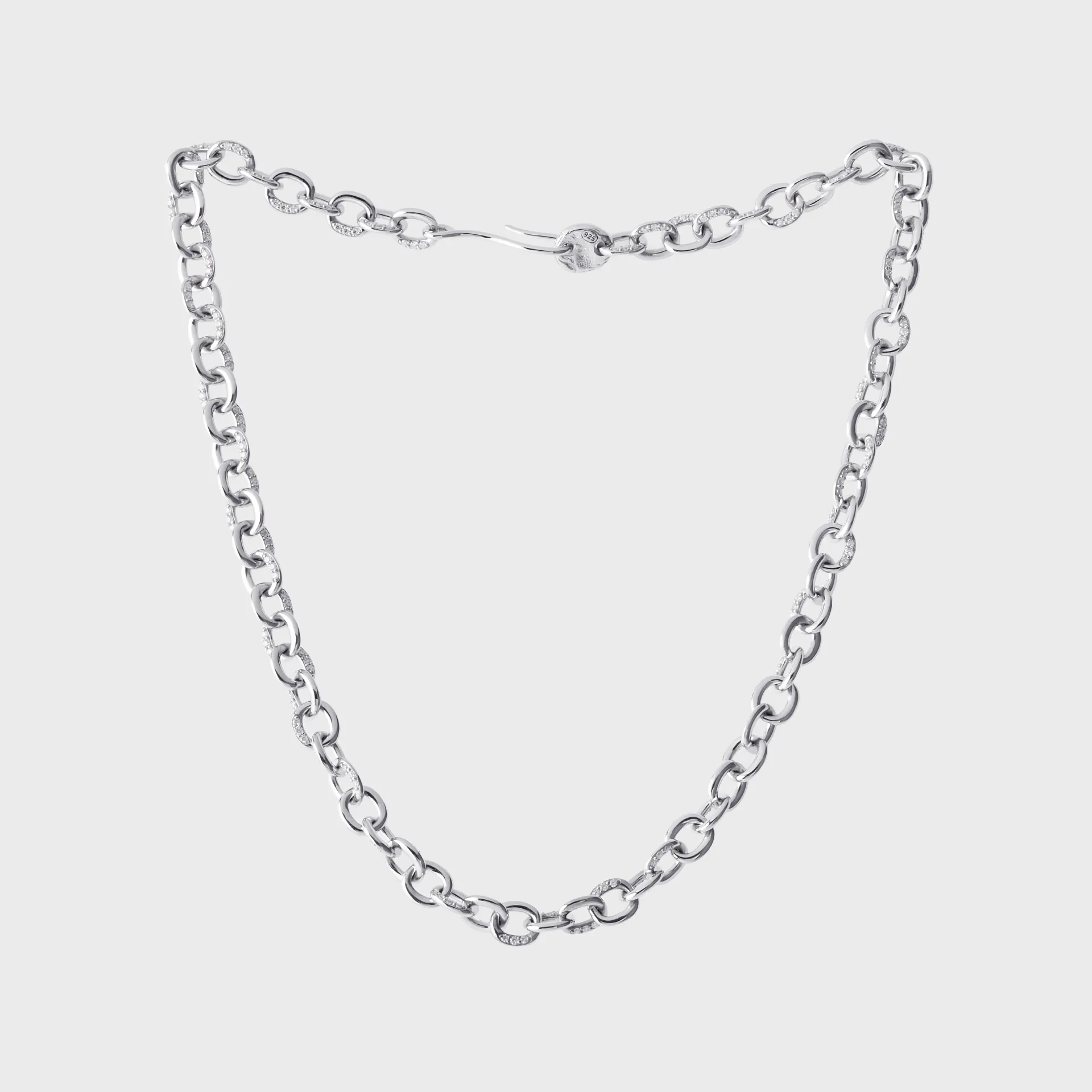 Bold silver diamond-link necklace photographed to show its full form and clasp.