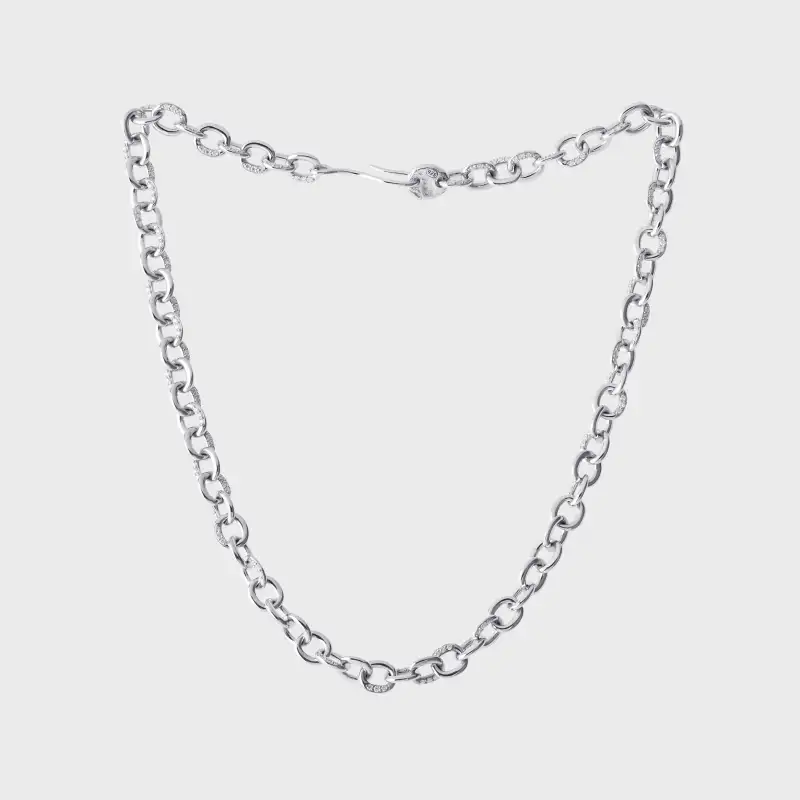Bold silver diamond-link necklace photographed to show its full form and clasp.