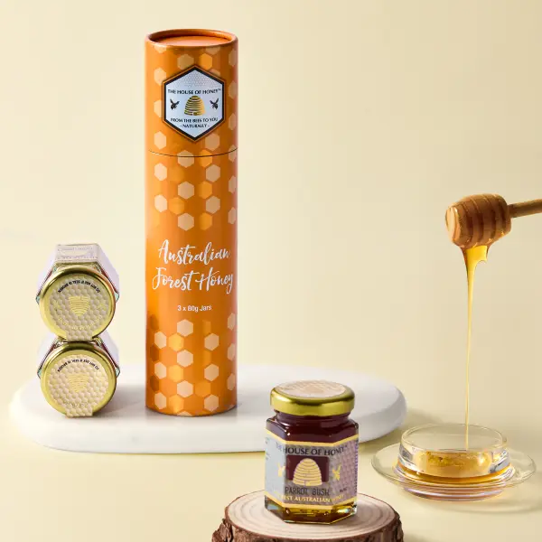 House of Honey gift tube with styled props, premium packaging photography for Perth artisan brands.