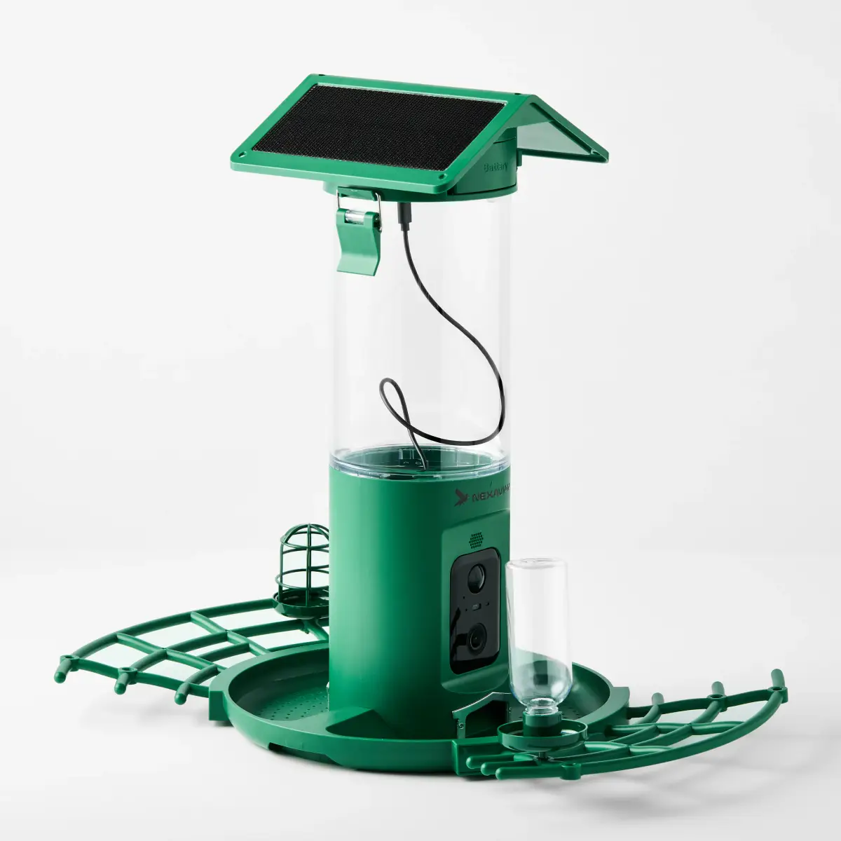 Nexavian camera bird feeder viewed at an angle with the solar-panel roof raised above its clear reservoir and feeding platform