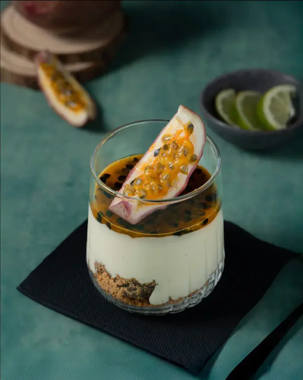 Passionfruit cheesecake dessert, cafe cabinet photography by Amplify Creative Lab.