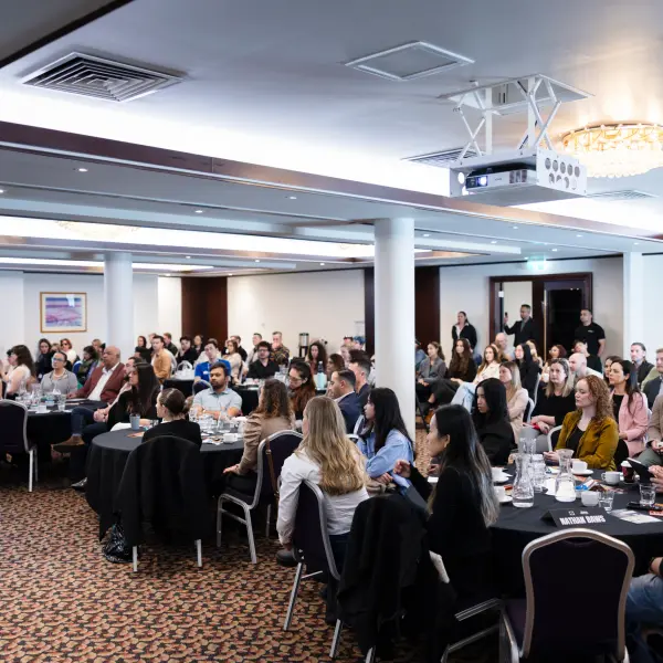 Wide audience and exhibition environment at a Perth business event