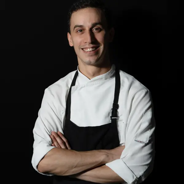 Perth chef photographed in uniform for a professional portrait.