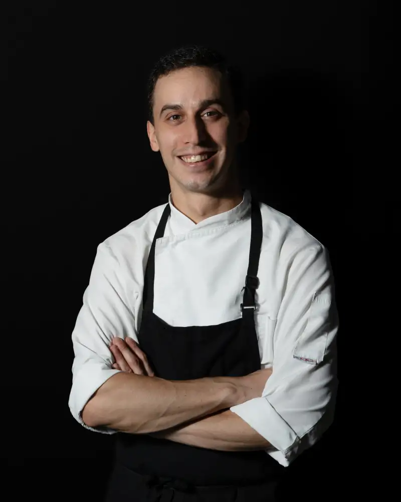 Perth chef photographed in uniform for a professional portrait.