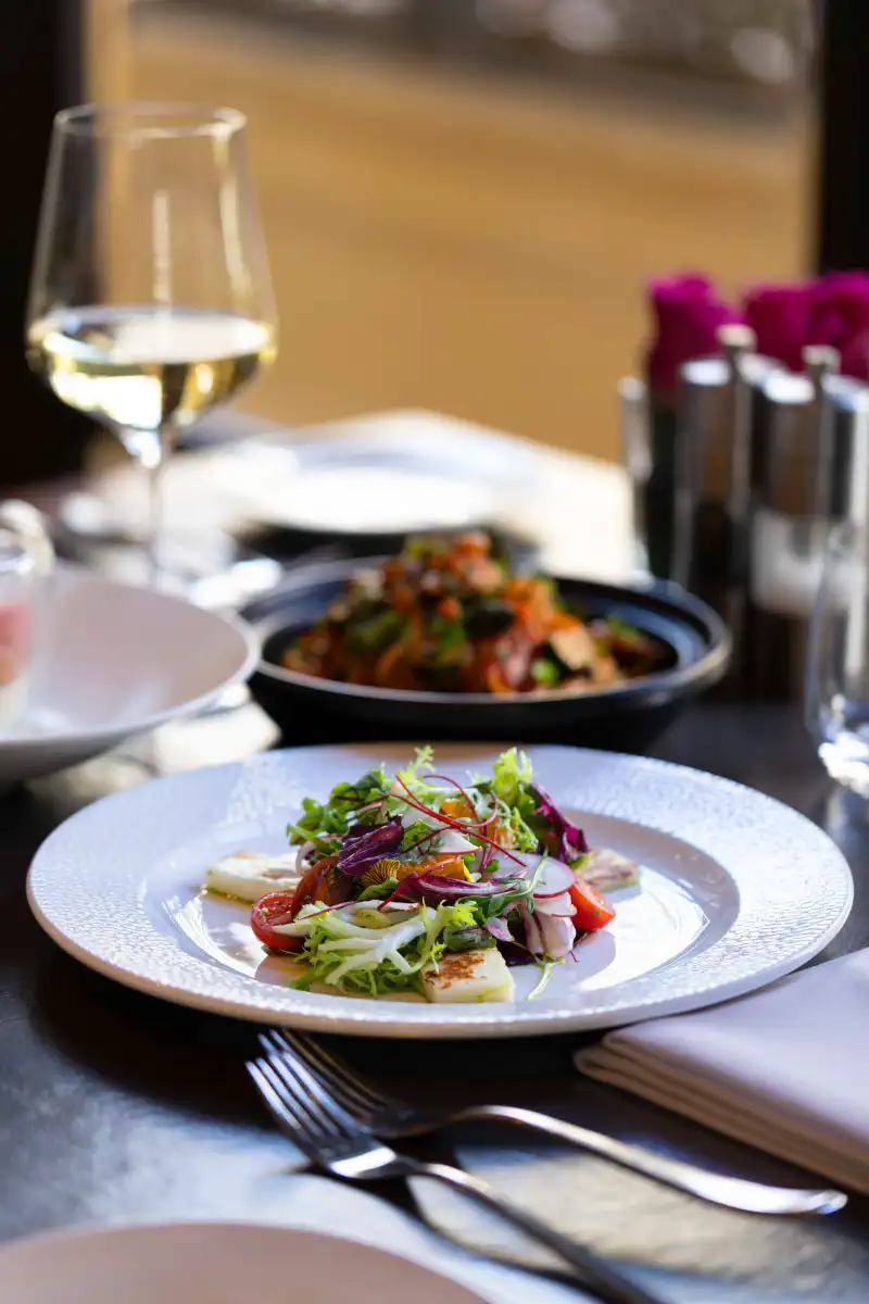 Warm ambient lighting in a Perth restaurant dining room, representing the hospitality experience fast websites help deliver.