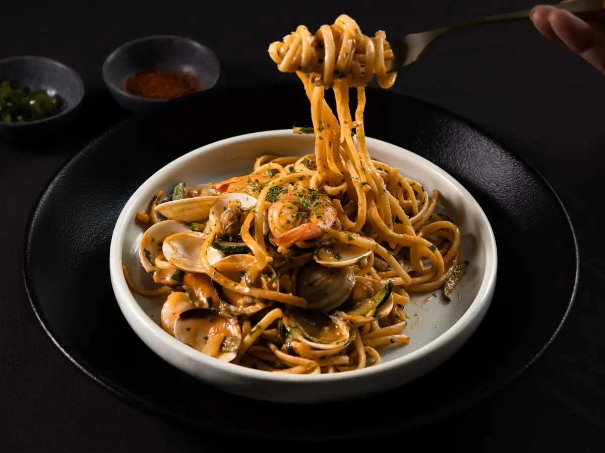 Seafood linguine with clams and prawns photographed for a Perth restaurant menu.