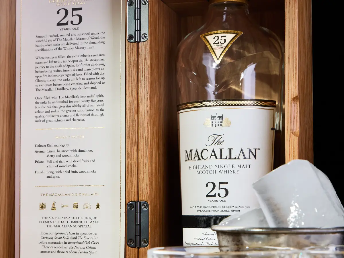 Macallan 25 whisky service photographed for T.O.T.O Bar with bottle presentation and crystal glassware