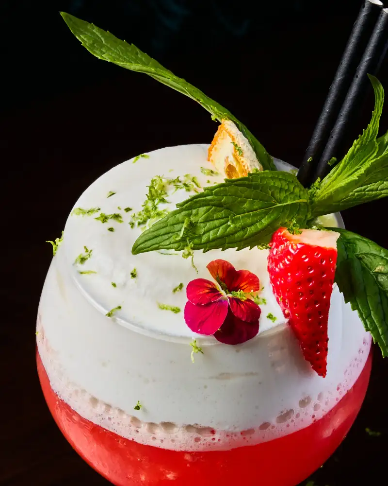 A raspberry foam cocktail photographed for beverage photography in Perth.