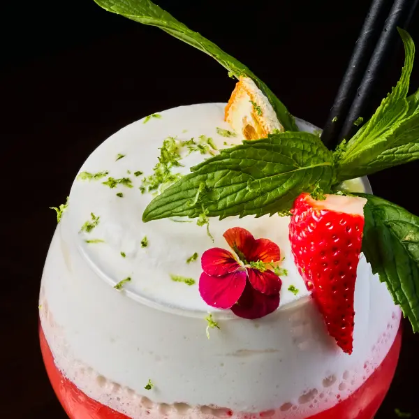 A raspberry foam cocktail photographed for beverage photography in Perth.