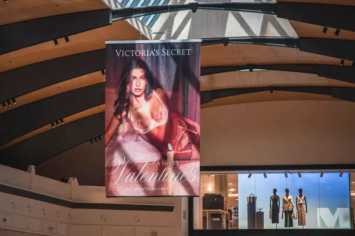 Victoria's Secret Valentine's promotional banner hanging inside Karrinyup Shopping Centre atrium