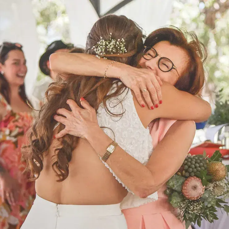 Bride embracing a guest during an intimate Perth wedding celebration