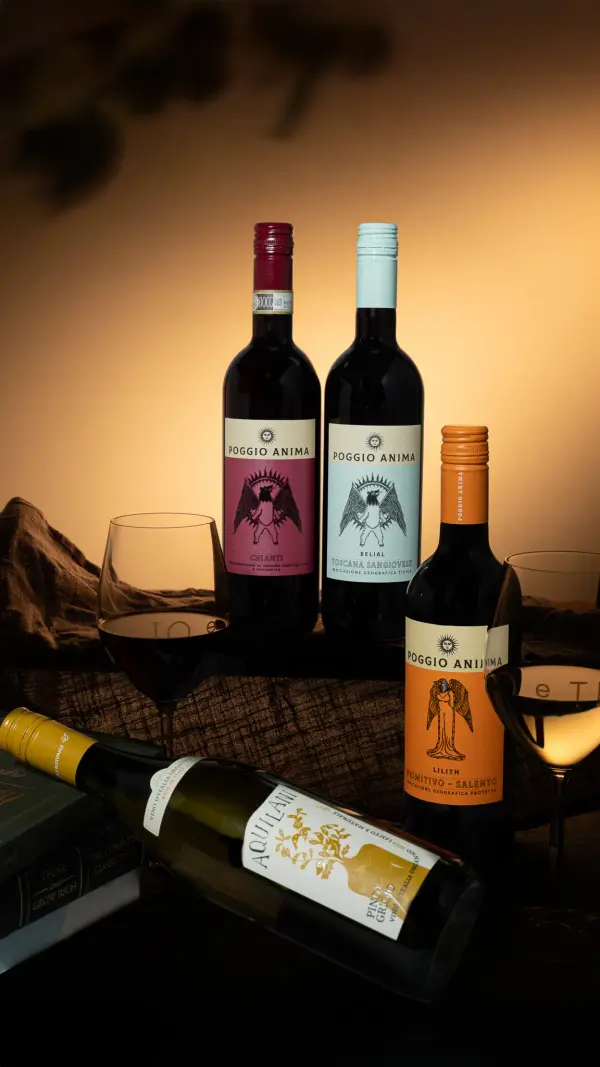 Collection of wine bottles with warm mood lighting, wine product photography for Perth wineries and retailers.